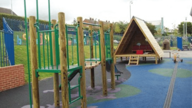 Wooden playground equipment and shelter