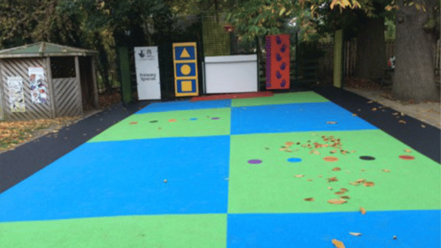 School playground with different coloured tarmac on the floor